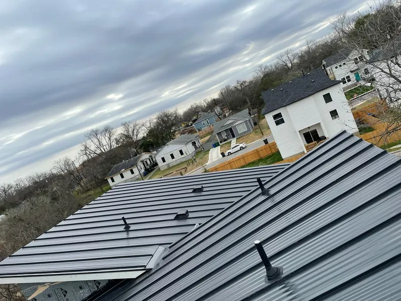 Standing seam metal roof panels with vents for Skylight Repair in Hornell